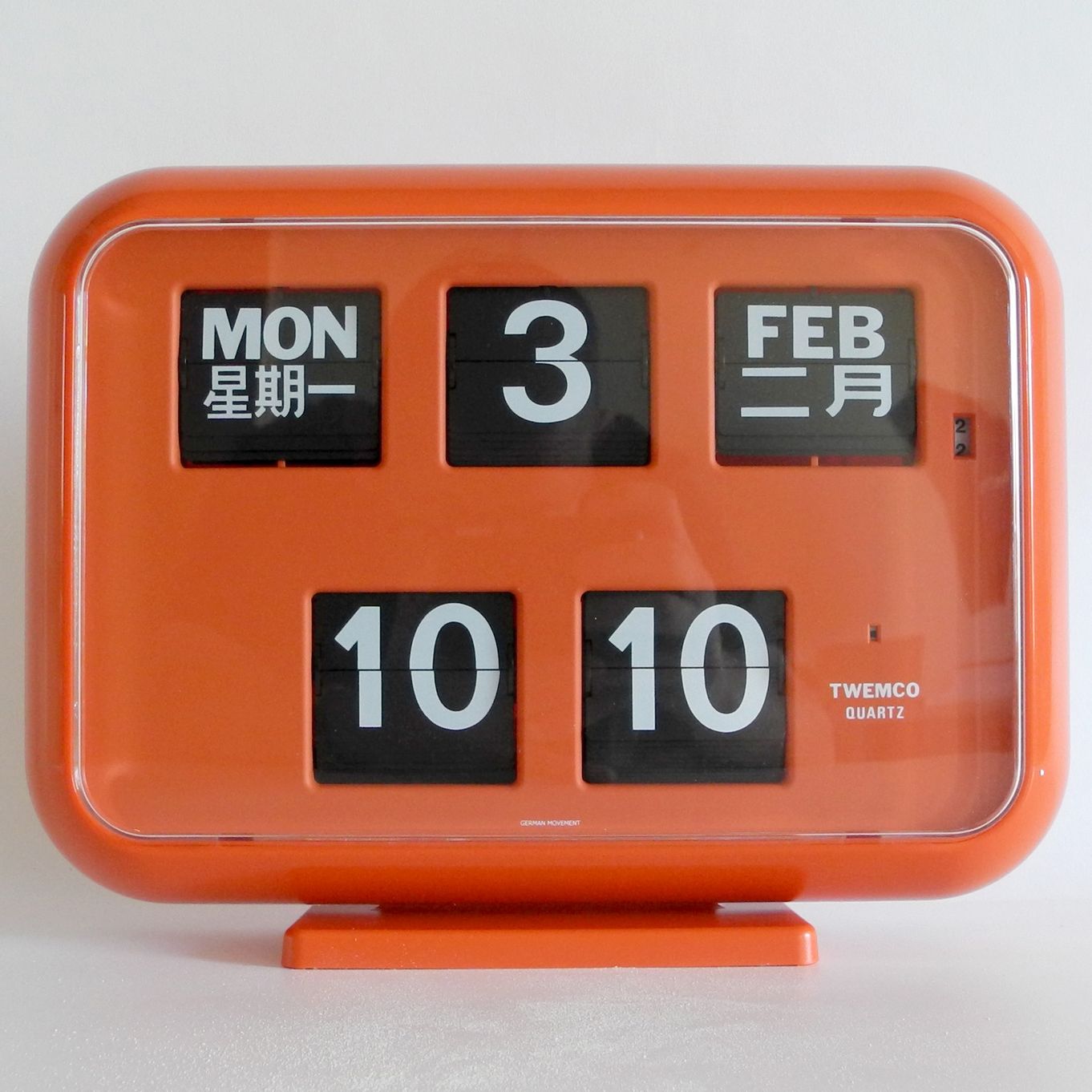 SMALL BILINGUAL BANKING HALL CLOCK by TWEMCO in ORANGE *LTD EDITION*